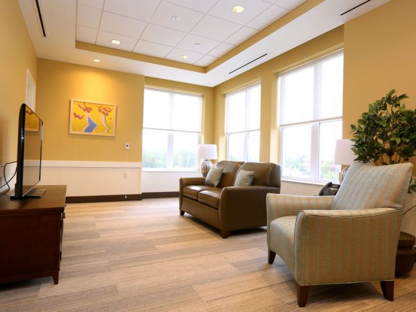 Seating space and TV in the Long-term care facility.